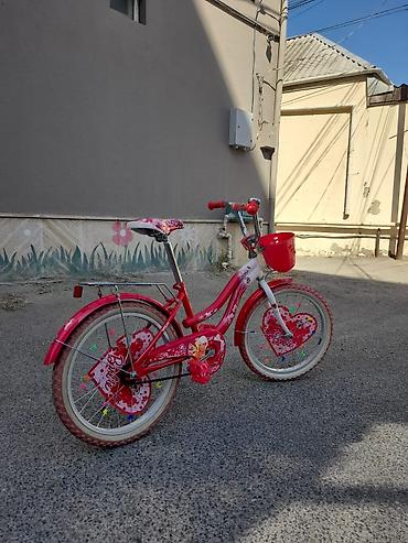Velosipedlər: Uşaq velosipedi – Barbie temalı, qırmızı/ağ dizayn. Xüsusiyyətlər: - — 2