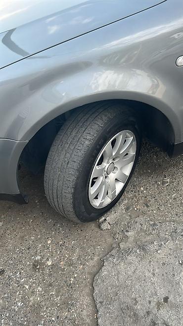 07 masin: Volkswagen orijinal 15" yüngül lehimli disklər və şinlər komplekti — 10