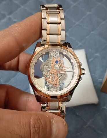 samsung gear s: Mexanika oxwar batareya ile iwleyen qol saati yenidir.arxa qabaq