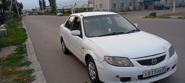 машина дишовый: Mazda Familia: 2001 г., 1.3 л, Автомат, Бензин, Седан