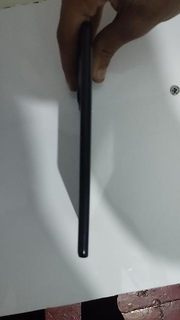 note 10 s: Arxa tərəfində "REDMI" brendi və "108MP" yazısı olan qara rəngli — 6