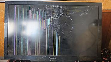 Телевизоры: Телевизор Panasonic VIERA, диагональ примерно 40–42". ЖК-панель с — 1
