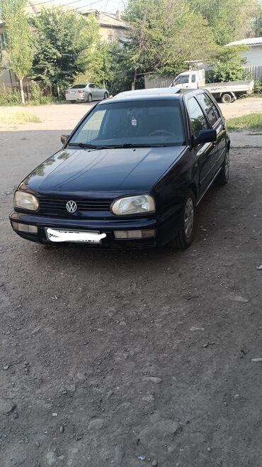 кулиса на гольф 2: Volkswagen Golf III — компактный и практичный хэтчбек тёмно-синего