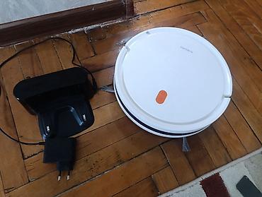 park sensor: Xiaomi robot tozsoran - Dairəvi, ağ korpus, üst paneldə iki düymə — 4