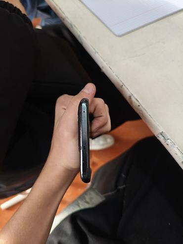 Мобильные телефоны: OnePlus (линейка Nord/10т — фирменный логотип OnePlus на задней — 2