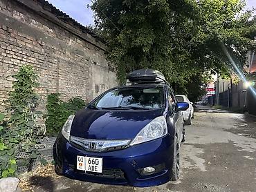 Honda Fit: 2009 г., 1.5 л, Автомат, Бензин, Хэтчбэк