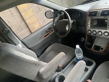 региональный: Kia Carnival: 2003 г., 3 л, Дизель, Минивэн — 7