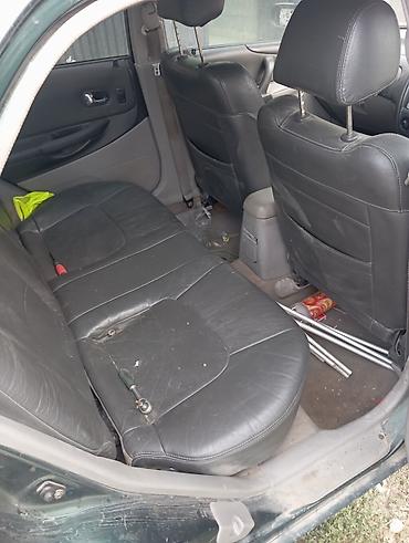 номера рф: Mazda 323: 2013 г., 1.5 л, Автомат, Бензин, Седан — 4