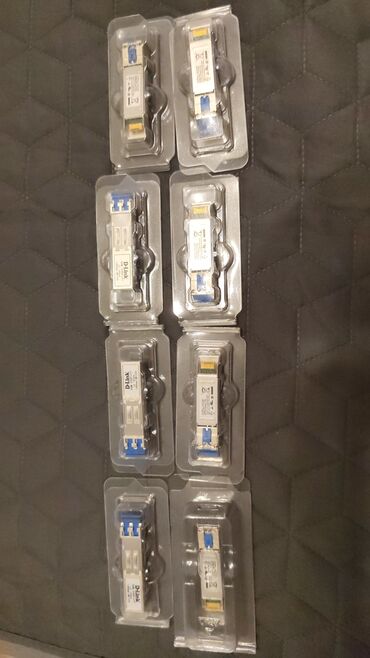 Şəkillərdə D-Link və Sipro markalı SFP modulları, ümumilikdə ondan çox