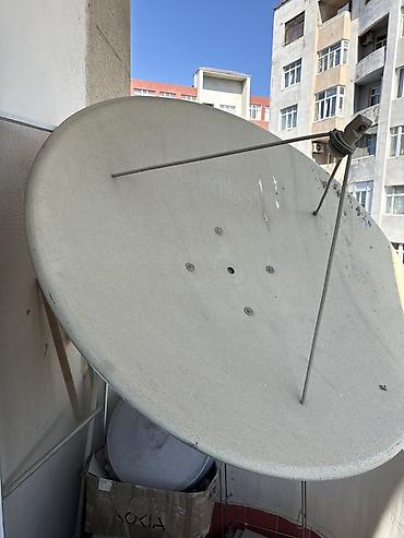 ТВ и видео: Böyük ölçülü peyk antenası (ofset tipli parabolik güzgü) - Təxminən 1 — 2