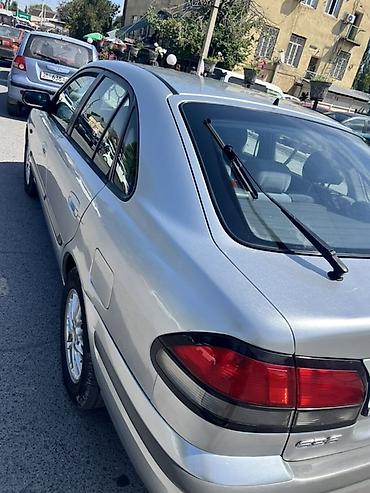 Транспорт: Mazda 626: 1999 г., 1.8 л, Бензин, Седан — 1