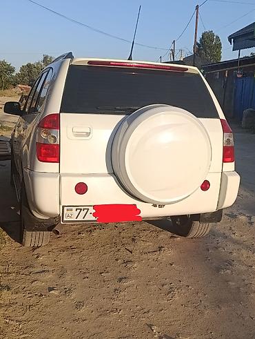 kia cerato 2012: Chery Tiggo (T11) krossover, ağ rəng. Texniki xüsusiyyətlər və — 1