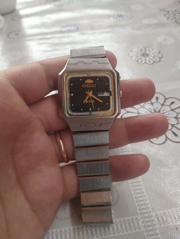 orient saat 1980: İşlənmiş, Qol saatı, Orient, rəng - Gümüşü