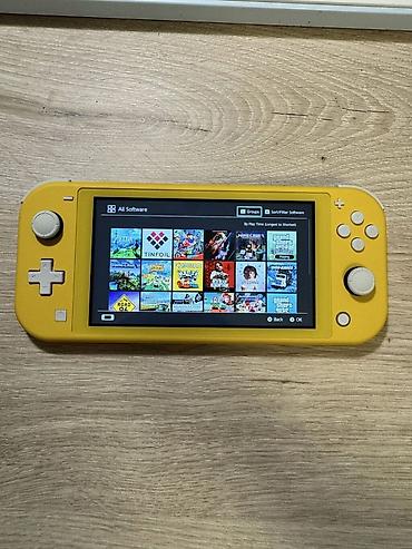 nintendo switch lite ikinci el: Nintendo Switch Lite oyun konsolu, ideal veziyyetdedir, seliqeli — 1