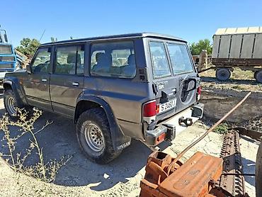 битые машины купить: Nissan Patrol: 1994 г. — 1