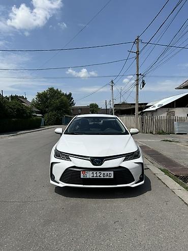машина гибрид марки: Toyota Corolla: 2021 г., 1.8 л, Вариатор, Гибрид, Седан — 1