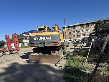 экскаваторы 140: Экскаватор, Hyundai, 2010 г., Колесный — 2