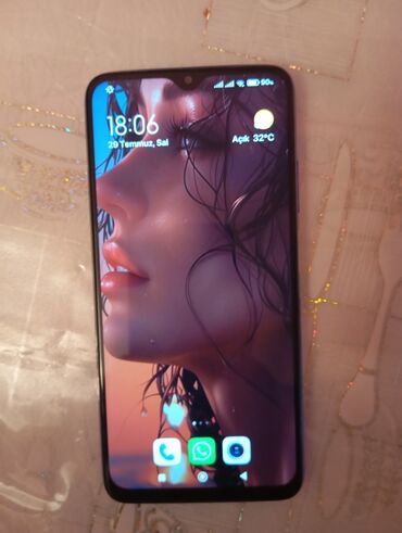 телефон fly ds185: Xiaomi Redmi 9T modeli, arxa tərəfində dörd kamera ilə təchiz