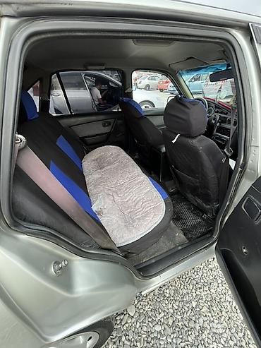 Унаа сатуу: Daewoo Nexia: 2013 г., 1.6 л, Кол менен иштөөчү, Бензин, Седан — 7