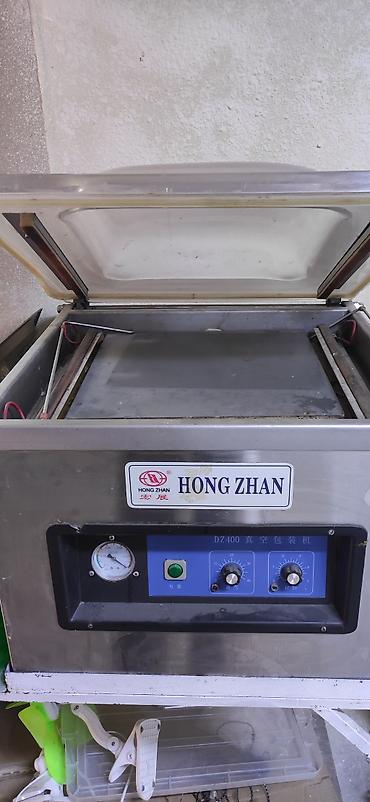 Вакуумный упаковщик камерного типа HONG ZHAN DZ400. Описание: -