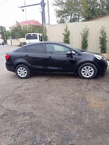kia march: Kia Rio: 1.6 l | 2014 il Sedan — 10