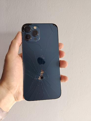 iphone 11 elde: IPhone 12 Pro Max, 128 GB, Pacific Blue, Simsiz şarj, Face ID — 7
