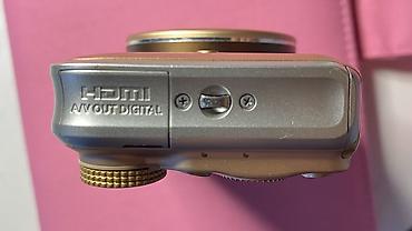 Canon PowerShot SX210 IS fotoaparatı satılır. Qızılı rəngdədir, çox az — 5