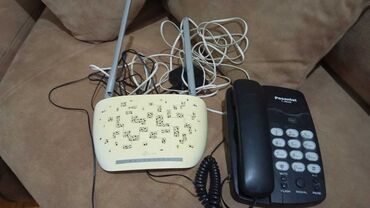 modem usb: TP-Link markalı, ağ ruter və Panasonic markalı stasionar telefon