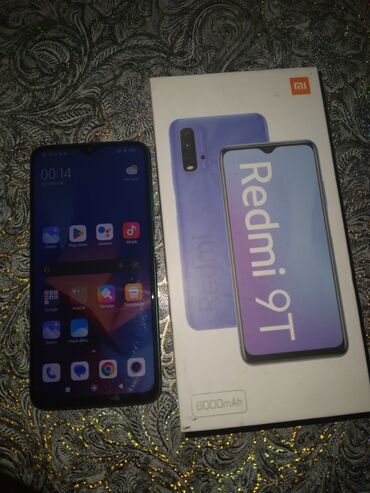 Xiaomi: Xiaomi Redmi 9T, 64 GB, rəng - Göy, 
 Zəmanət, Barmaq izi, İki sim kartlı