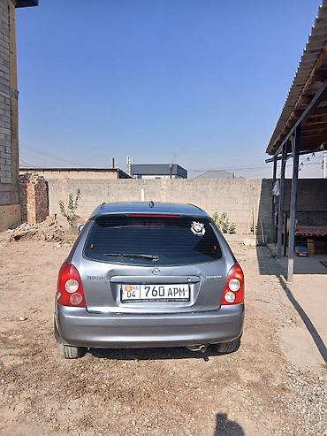 пф 021: Mazda 323: 2003 г., Механика, Бензин, Универсал — 4