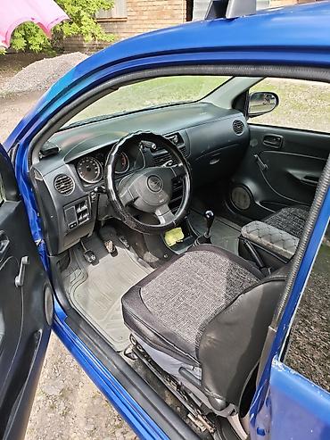 1: Daihatsu Cuore: 2003 г., 1 л, Механика, Бензин, Хэтчбэк — 7
