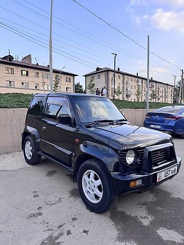 тоя пистолет: Mitsubishi Pajero Junior: 1998 г., 1.1 л, Автомат, Бензин, Внедорожник — 3