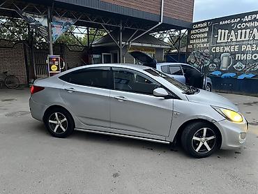 pajero 4: Hyundai Solaris: 2013 г., 1.6 л, Автомат, Газ, Седан — 3