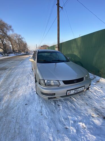 Mazda: Mazda 323: 1995 г., 1.5 л, Механика, Бензин, Седан