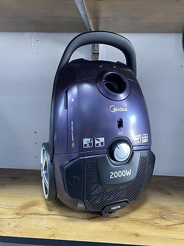Пылесос Midea MKC2TWN - Мощность: 2000 Вт — высокая сила всасывания
