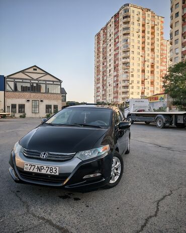 ən yaxşı akkumulyator: Honda Insight: 1.3 l | 2009 il Sedan