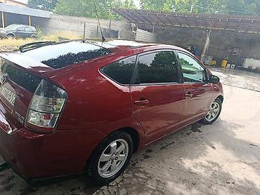 renault megane 2: Toyota Prius: 1.5 l | 2005 il Sedan — 10