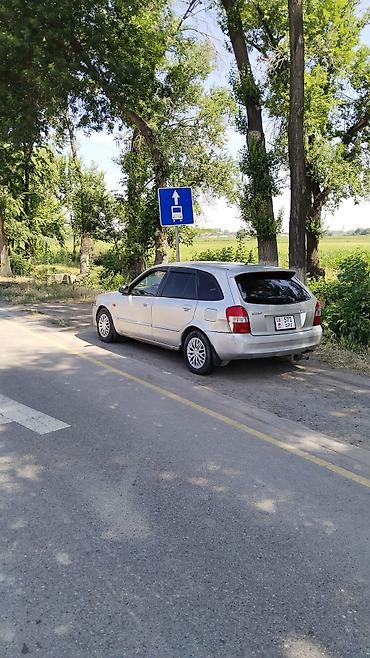 mazda 2000: Mazda 323: 2002 г., 1.6 л, Автомат, Бензин, Универсал — 4