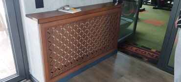 Другие строительные материалы: Декоративные решотки для батареи — 20