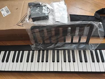 pianolar: Məhsul: Yığıla bilən rəqəmsal piano (Foldable Piano) Xüsusiyyətlər: - — 3