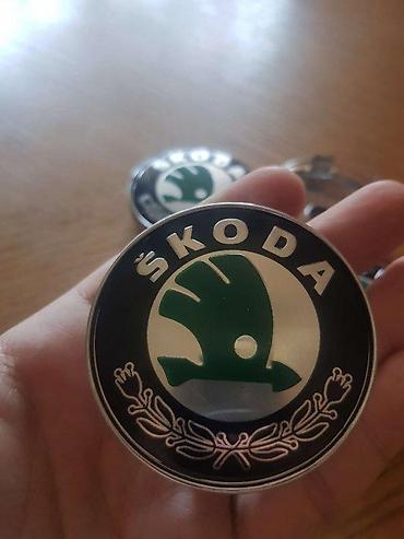 Gume i felne: ČEPOVI ZA FELNE ŠKODA 60 MM / 56 MM - ZELENI - ORIGINALNI | — 1