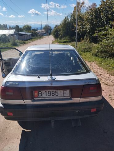 авто бостери: Mazda 626: 1988 г., 2.2 л, Механика, Бензин, Хетчбек