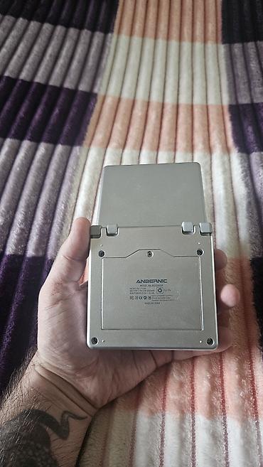 retroid pocket 5: Anbernic RG35XXSP — retro oyunlar üçün nəzərdə tutulmuş portativ (əl — 3