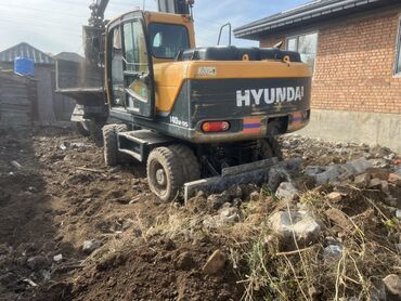 ремонт кухонных плит: Услуги колесного экскаватора Hyundai 140W-9S гидромолот планировочный