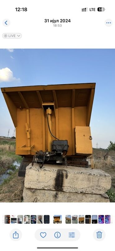 turbo az su masinlari: Sarı rəngdə, hidravlik qaldırıcı mexanizmlə təchiz olunmuş yük maşını