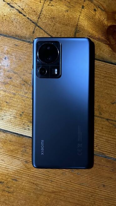 150 manata telefonlar: Xiaomi 13 Lite, 256 ГБ, цвет - Синий, 
 Сенсорный, Отпечаток пальца, Беспроводная зарядка