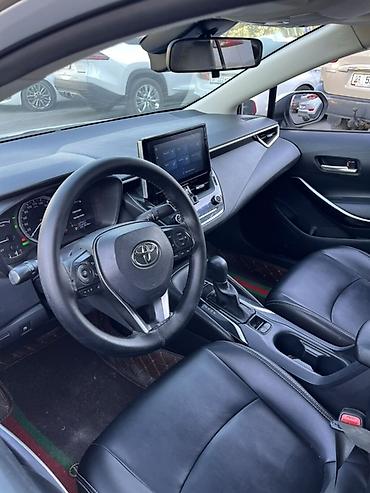 селика: Toyota Corolla: 2020 г., 1.8 л, Автомат, Гибрид, Седан — 7
