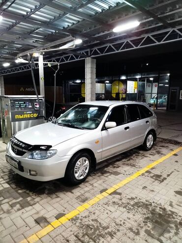 франталны погрузчик: Mazda Familia: 2003 г., Бензин, Седан