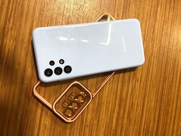 tap az telefonlar ucuz qiymete: Samsung Galaxy A13, 64 ГБ, цвет - Голубой, Отпечаток пальца, Две SIM карты, Face ID