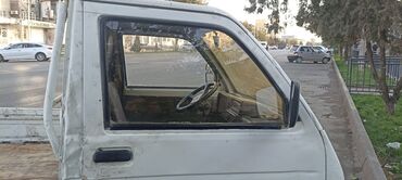 муссо двигателя: Компактный бортовой мини-грузовик (праворульная кабина) с открытой